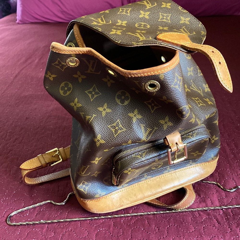 Louis Vuitton Monogram Montsouris PM backpack missing cinch cord